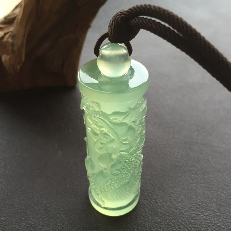 Carved Light green talisman pendant, view 1
